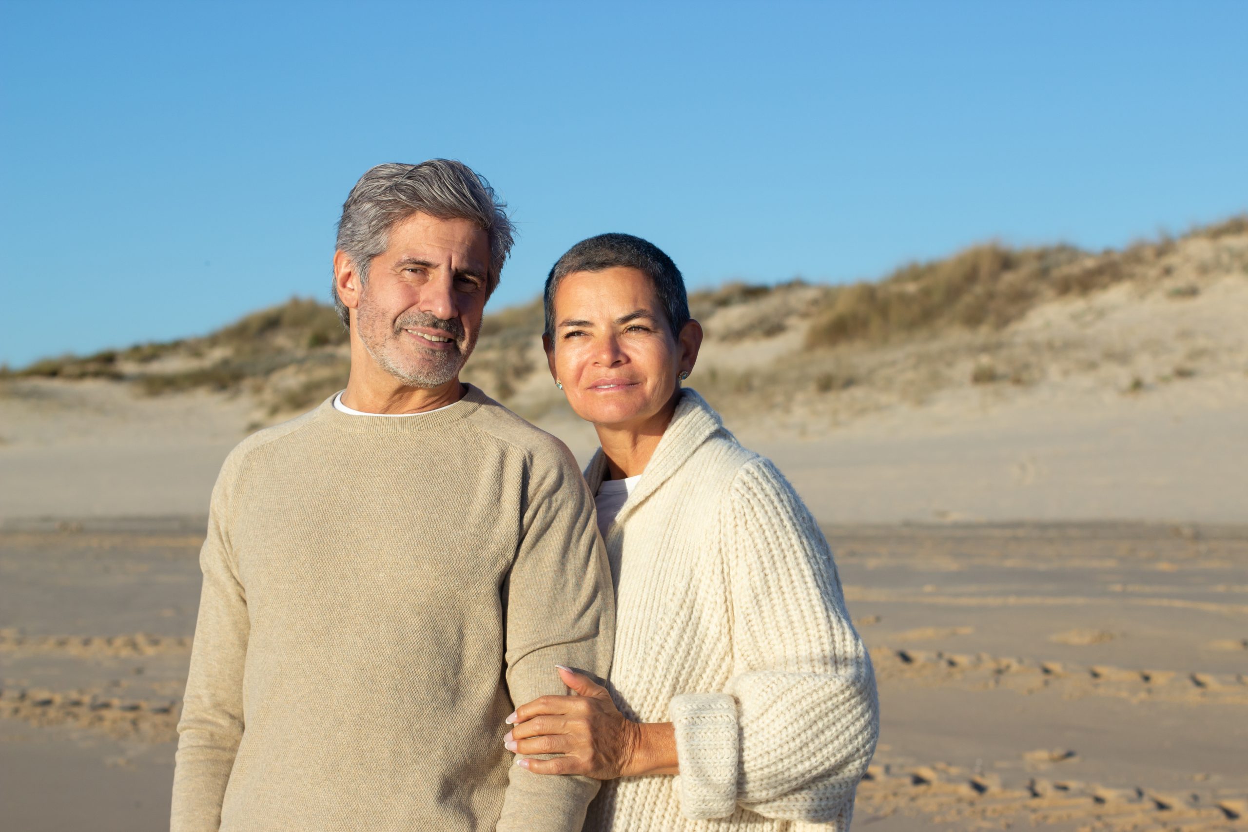 Senior couple spending time outside at seashore together